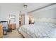 King-size bed in bedroom with access to bathroom and living area at 4215 Caddie E Dr # 101, Bradenton, FL 34203