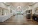Elegant community clubhouse lobby with hardwood floors and seating at 4215 Caddie E Dr # 101, Bradenton, FL 34203
