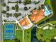 Community overview showing tennis courts, clubhouse, and pool at 4215 Caddie E Dr # 101, Bradenton, FL 34203