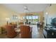 Living room with lake view and comfortable seating at 4215 Caddie E Dr # 101, Bradenton, FL 34203