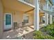 Condo entry with private patio and seating area at 4215 Caddie E Dr # 101, Bradenton, FL 34203