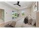 Main bedroom with sliding glass doors to backyard at 8380 Malcolm Ave, North Port, FL 34287