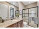 Bathroom boasts granite countertop and a large shower at 13721 Palazzo Ter, Bradenton, FL 34211