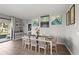 Charming dining room with wooden table and chairs, perfect for Gathering gatherings at 15739 Barefoot Beach Dr, Bradenton, FL 34211