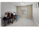 Home office with a desk, computer, rolling chair, and a large window at 15739 Barefoot Beach Dr, Bradenton, FL 34211