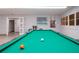 Well-lit game room with a billiard table at 808 Mandarin Cir, Bradenton, FL 34208