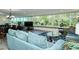 Spacious living room with ample natural light and seating at 100 Sands Point Rd # 324, Longboat Key, FL 34228