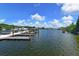 Tranquil marina with multiple boat docks and calm water at 100 Sands Point Rd # 324, Longboat Key, FL 34228