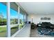 Living area with water views and built-in window seat at 100 Sands Point Rd # 324, Longboat Key, FL 34228