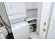 Convenient laundry room with stackable washer and dryer at 100 Sands Point Rd # 324, Longboat Key, FL 34228