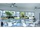 Bright community room with large windows and seating at 100 Sands Point Rd # 324, Longboat Key, FL 34228