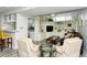 Spacious living room with built-in shelving and comfortable seating at 100 Sands Point Rd # 324, Longboat Key, FL 34228