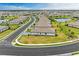 Aerial view of community, showing a pond and neighborhood at 15739 Barefoot Beach Dr, Bradenton, FL 34211