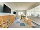 playroom with toys, a playhouse and large screen TV at 15739 Barefoot Beach Dr, Bradenton, FL 34211