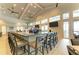 Indoor bar with seating and modern finishes at 15739 Barefoot Beach Dr, Bradenton, FL 34211