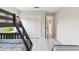 View of the light and airy bedroom featuring wood-look flooring and closet at 2511 Stagnaro Rd, North Port, FL 34287