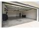 Large garage featuring lots of room for parking and storage, with work and organizational space at 2511 Stagnaro Rd, North Port, FL 34287