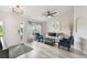 Inviting living room with ample natural light, neutral tones, and stylish furnishings at 2511 Stagnaro Rd, North Port, FL 34287