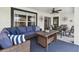 Covered patio featuring cozy seating and an outdoor dining area, perfect for relaxation and entertaining at 2511 Stagnaro Rd, North Port, FL 34287