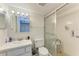 Bathroom with walk-in shower and vanity at 4159 Heron Way # E303, Bradenton, FL 34205