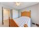 Simple bedroom with a double bed, dresser and closet at 4159 Heron Way # E303, Bradenton, FL 34205