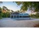 Large two-story house with screened porch and spacious backyard at 655 N Clermont Rd, Venice, FL 34292