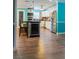 Modern kitchen features stainless steel appliances and an island with a wine cooler at 655 N Clermont Rd, Venice, FL 34292