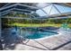 Relaxing pool area with waterfall feature and lounge chairs at 655 N Clermont Rd, Venice, FL 34292