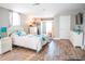 Guest bedroom with a queen-size bed and plenty of closet space at 655 N Clermont Rd, Venice, FL 34292