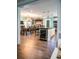 Open kitchen with island, wine cooler, and dining area at 655 N Clermont Rd, Venice, FL 34292
