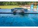 Inviting pool with a waterfall and spacious patio at 655 N Clermont Rd, Venice, FL 34292