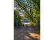 Private gated entrance leading to a charming two story home at 655 N Clermont Rd, Venice, FL 34292