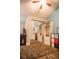 Bright bedroom with built-in shelving and plush rug at 655 N Clermont Rd, Venice, FL 34292