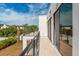 Modern balcony overlooking lush greenery at 1734 Wisconsin Ln, Sarasota, FL 34239