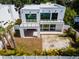 Aerial view of a modern two-story home with a patio at 1734 Wisconsin Ln, Sarasota, FL 34239