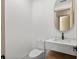 Modern powder room with floating vanity and marble countertop at 1734 Wisconsin Ln, Sarasota, FL 34239