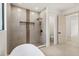 Contemporary bathroom with walk-in shower and freestanding bathtub at 1734 Wisconsin Ln, Sarasota, FL 34239