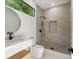 Contemporary bathroom with walk-in shower and floating vanity at 1734 Wisconsin Ln, Sarasota, FL 34239