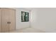 Simple bedroom with light wood flooring and double doors at 1734 Wisconsin Ln, Sarasota, FL 34239