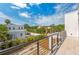 Private balcony overlooking the backyard and neighboring houses at 1734 Wisconsin Ln, Sarasota, FL 34239