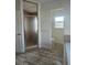 Bathroom with tiled walk-in shower, water closet, luxury vinyl floors, and soaking tub at 15 Tee View Pl, Rotonda West, FL 33947