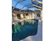 Outdoor pool with beautiful reflective water offers a relaxing space for recreation at 15 Tee View Pl, Rotonda West, FL 33947