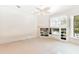 Bright bonus room featuring tile floors and a built-in entertainment center at 7249 Orchid Island Pl, Bradenton, FL 34202