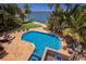 Inviting pool area with ample lounge space and water views at 3544 San Remo Ter, Sarasota, FL 34239