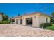 Spacious three-car garage with paver driveway at 3544 San Remo Ter, Sarasota, FL 34239