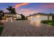 Large driveway with three-car garage and additional detached garage at 3544 San Remo Ter, Sarasota, FL 34239