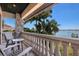 Relaxing balcony overlooking the water with seating for two at 3544 San Remo Ter, Sarasota, FL 34239
