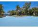 Private outdoor basketball court with surrounding landscaping at 3544 San Remo Ter, Sarasota, FL 34239