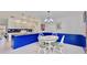 Inviting dining area with views of the kitchen with bright white cabinets and open concept layout at 1415 Piedmont Rd, Venice, FL 34293