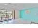 Charming dining area with table and chairs, view to patio at 1415 Piedmont Rd, Venice, FL 34293